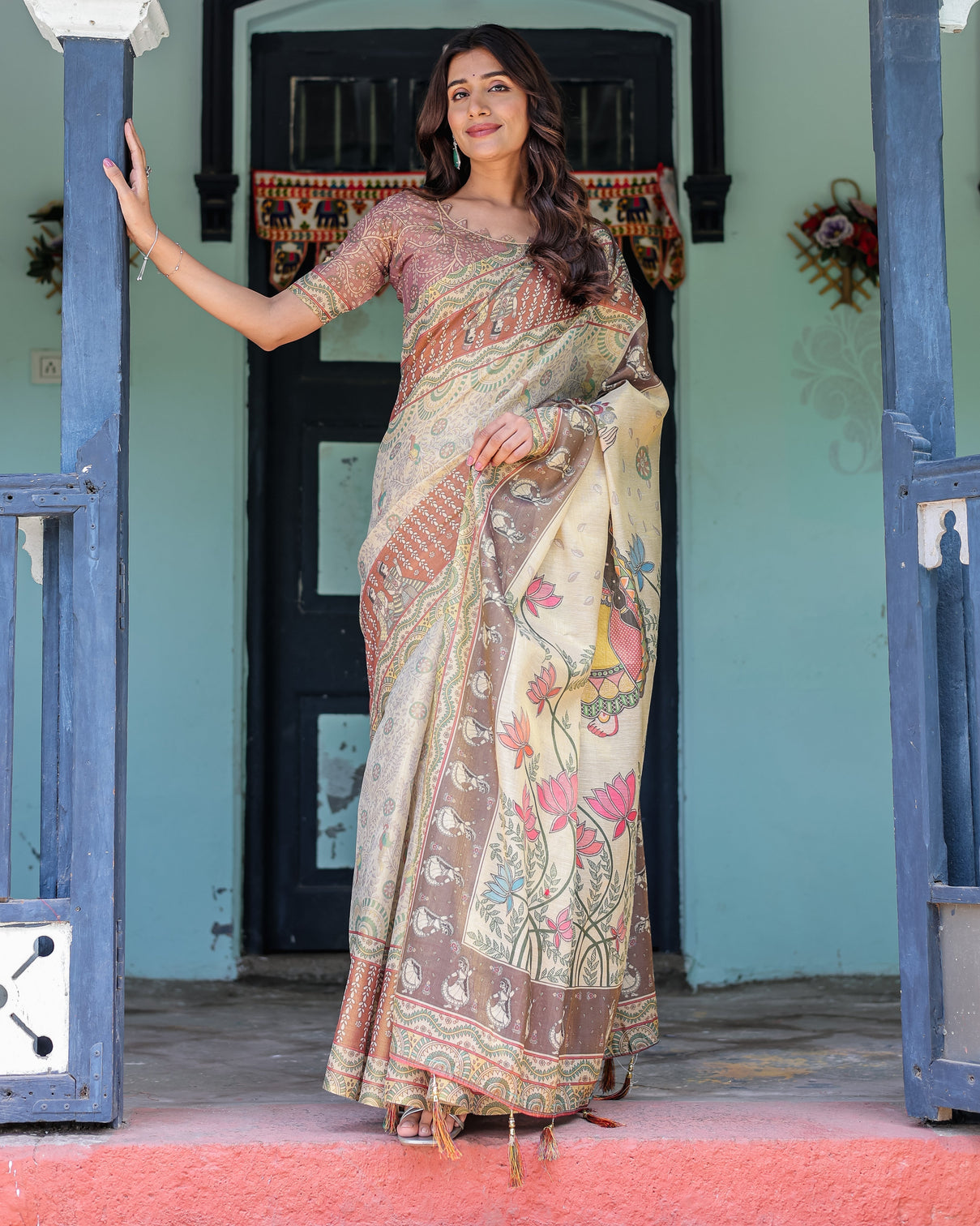Ivory brown handloom cotton saree with classical dancer motifs madhubani inspired pallu