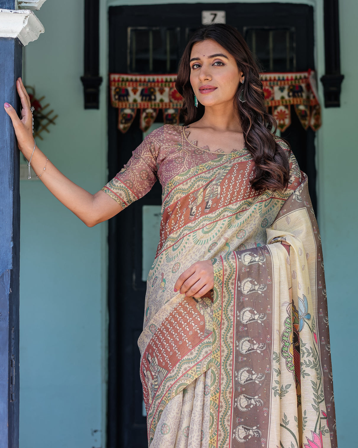 Ivory brown handloom cotton saree with classical dancer motifs madhubani inspired pallu