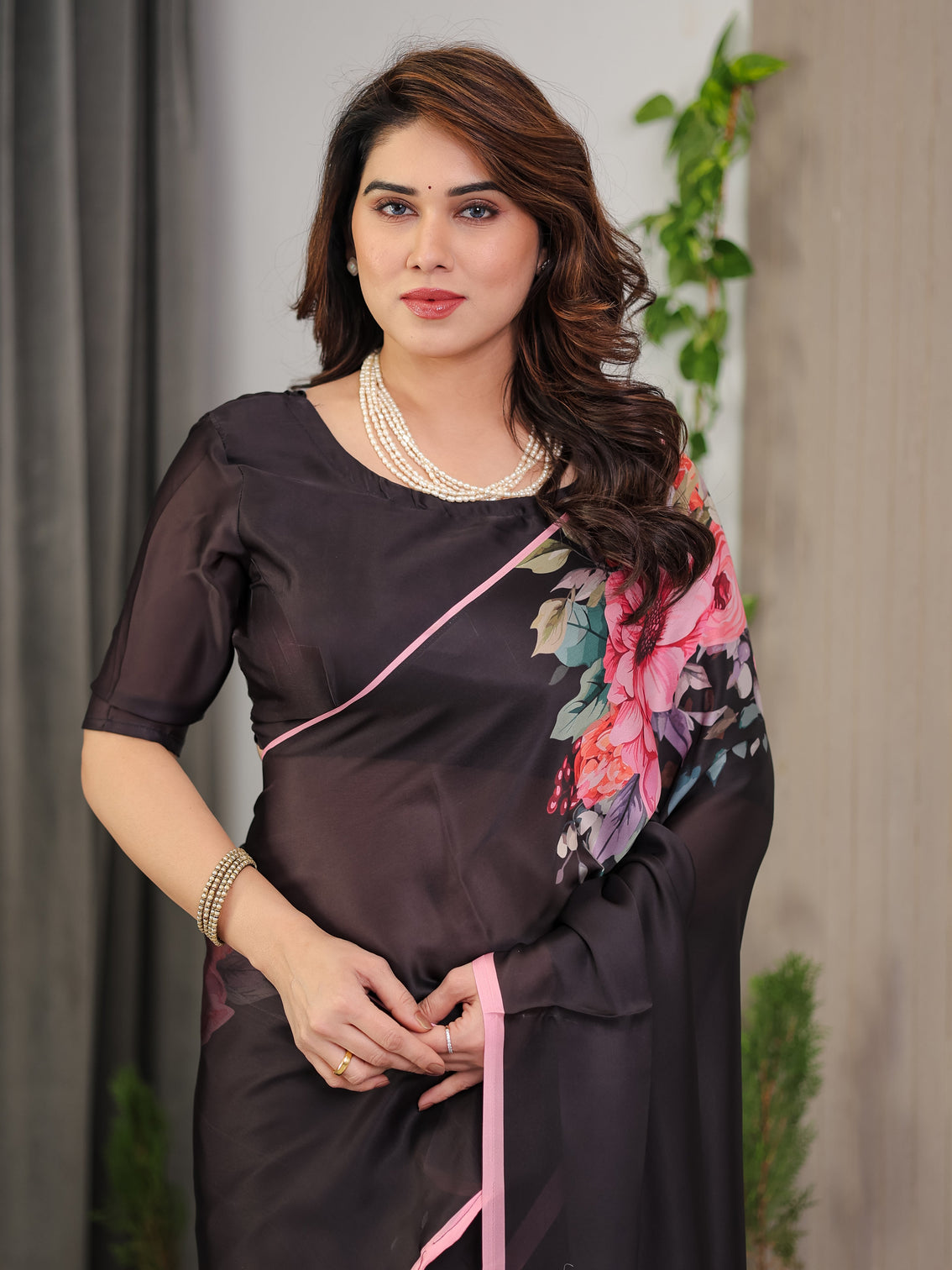 Black satin georgette floral printed saree with soft pink border attached blouse elegant designer partywear drape