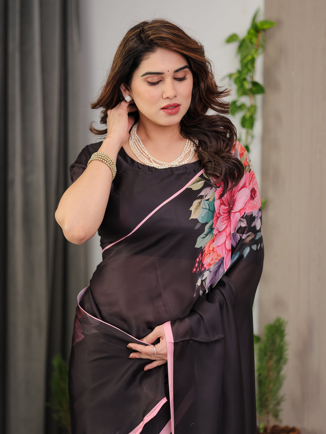 Black satin georgette floral printed saree with soft pink border attached blouse elegant designer partywear drape