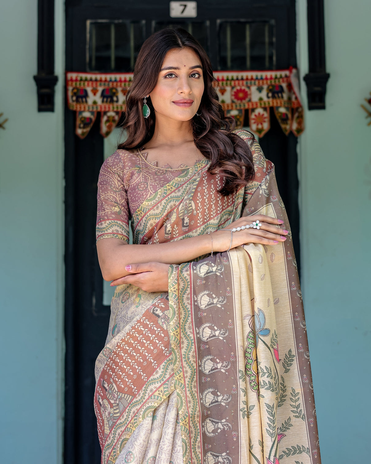Ivory brown handloom cotton saree with classical dancer motifs madhubani inspired pallu