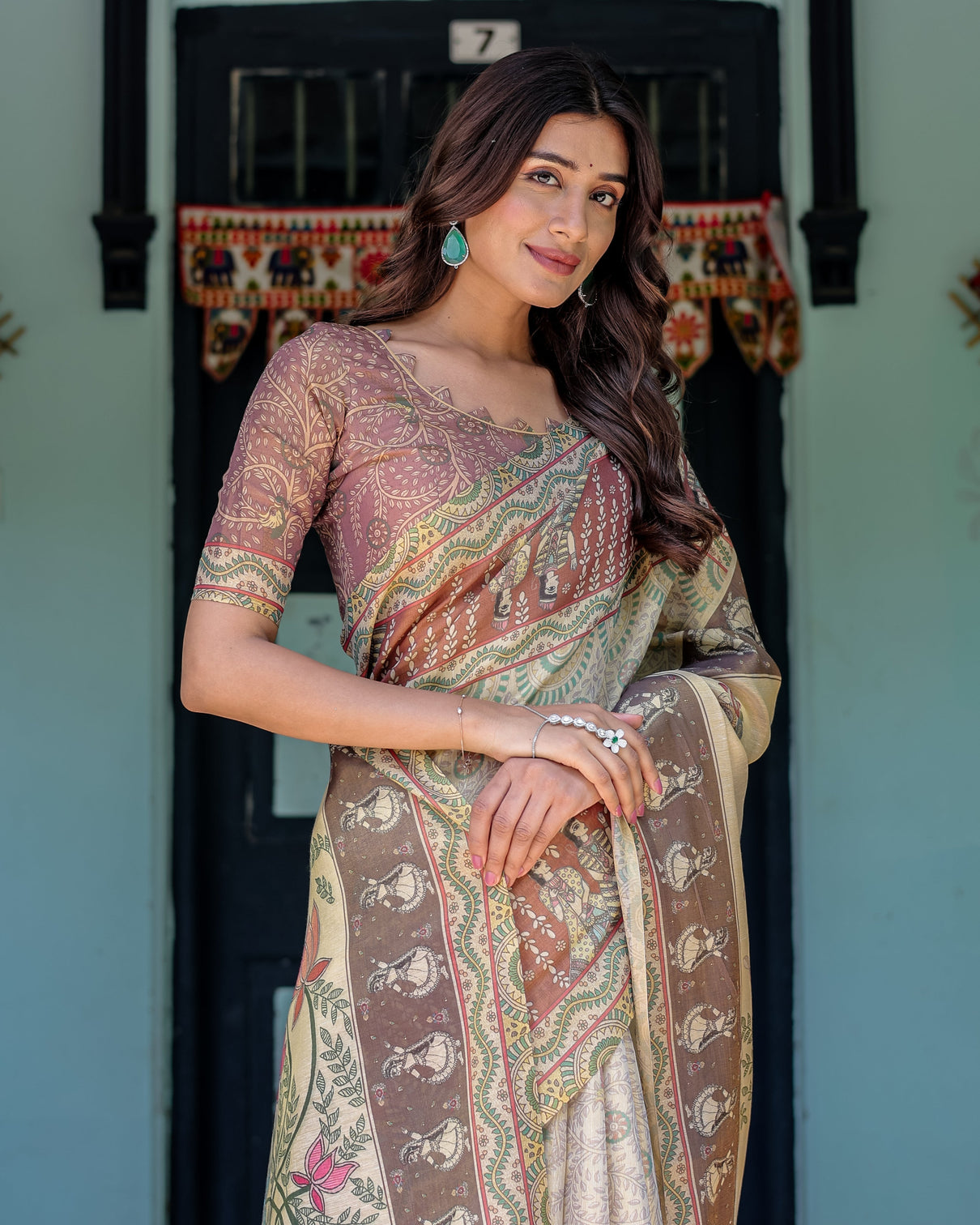 Ivory brown handloom cotton saree with classical dancer motifs madhubani inspired pallu