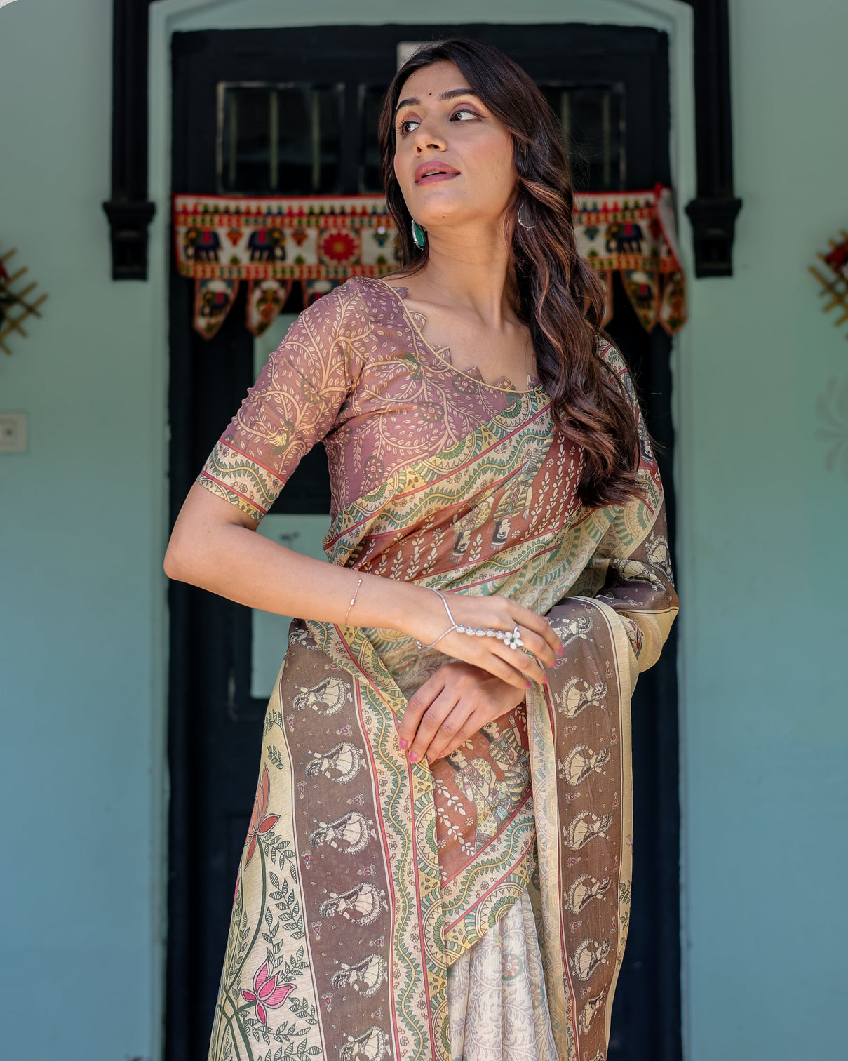Ivory brown handloom cotton saree with classical dancer motifs madhubani inspired pallu