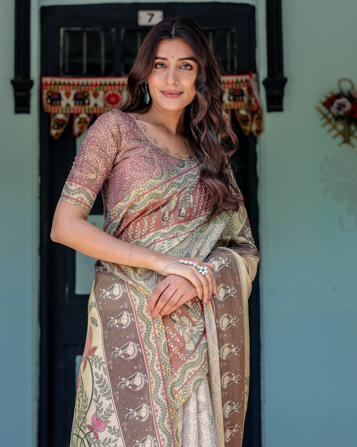 Ivory brown handloom cotton saree with classical dancer motifs madhubani inspired pallu