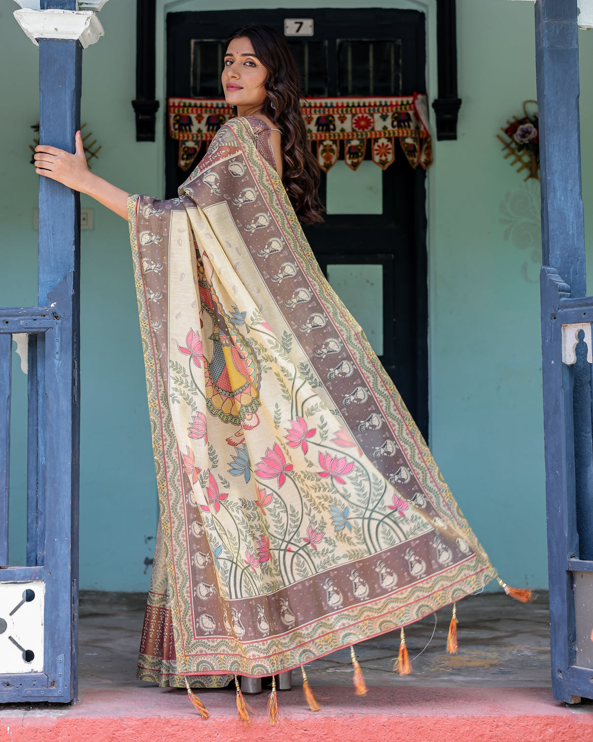 Ivory brown handloom cotton saree with classical dancer motifs madhubani inspired pallu