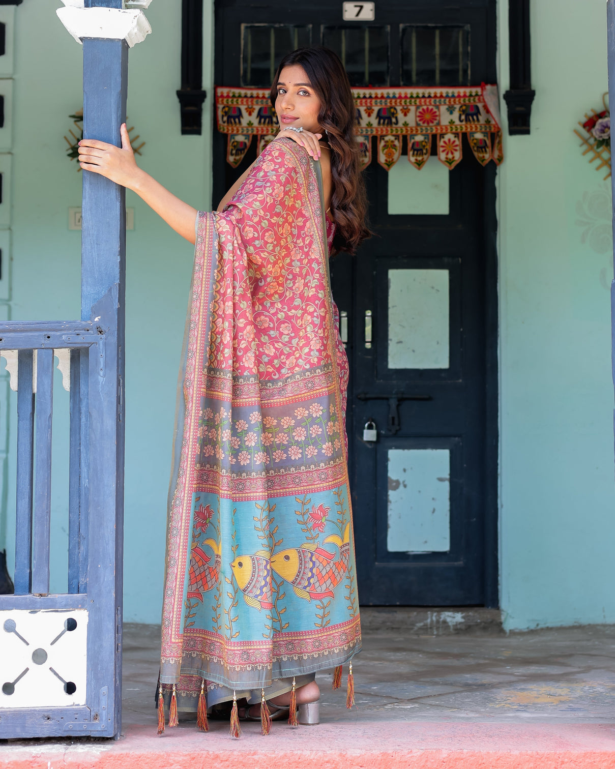 Rosewood red handloom cotton saree with artistic fish pallu floral vine print