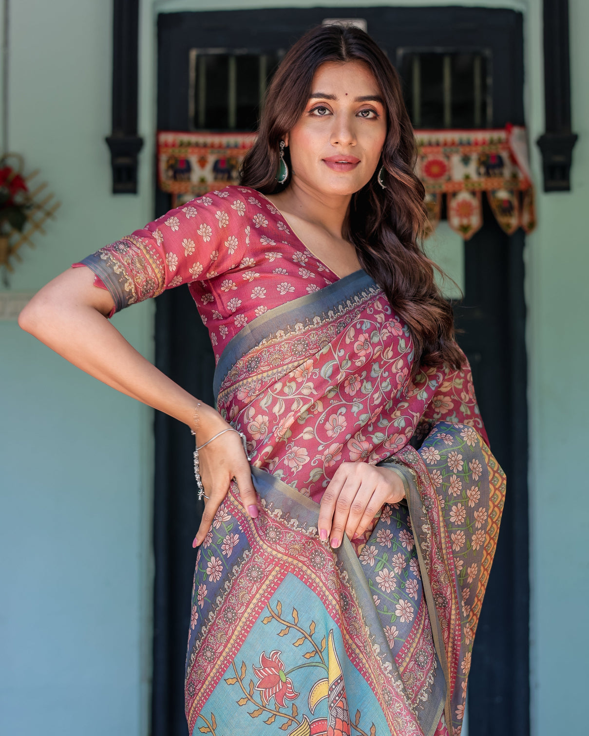 Rosewood red handloom cotton saree with artistic fish pallu floral vine print