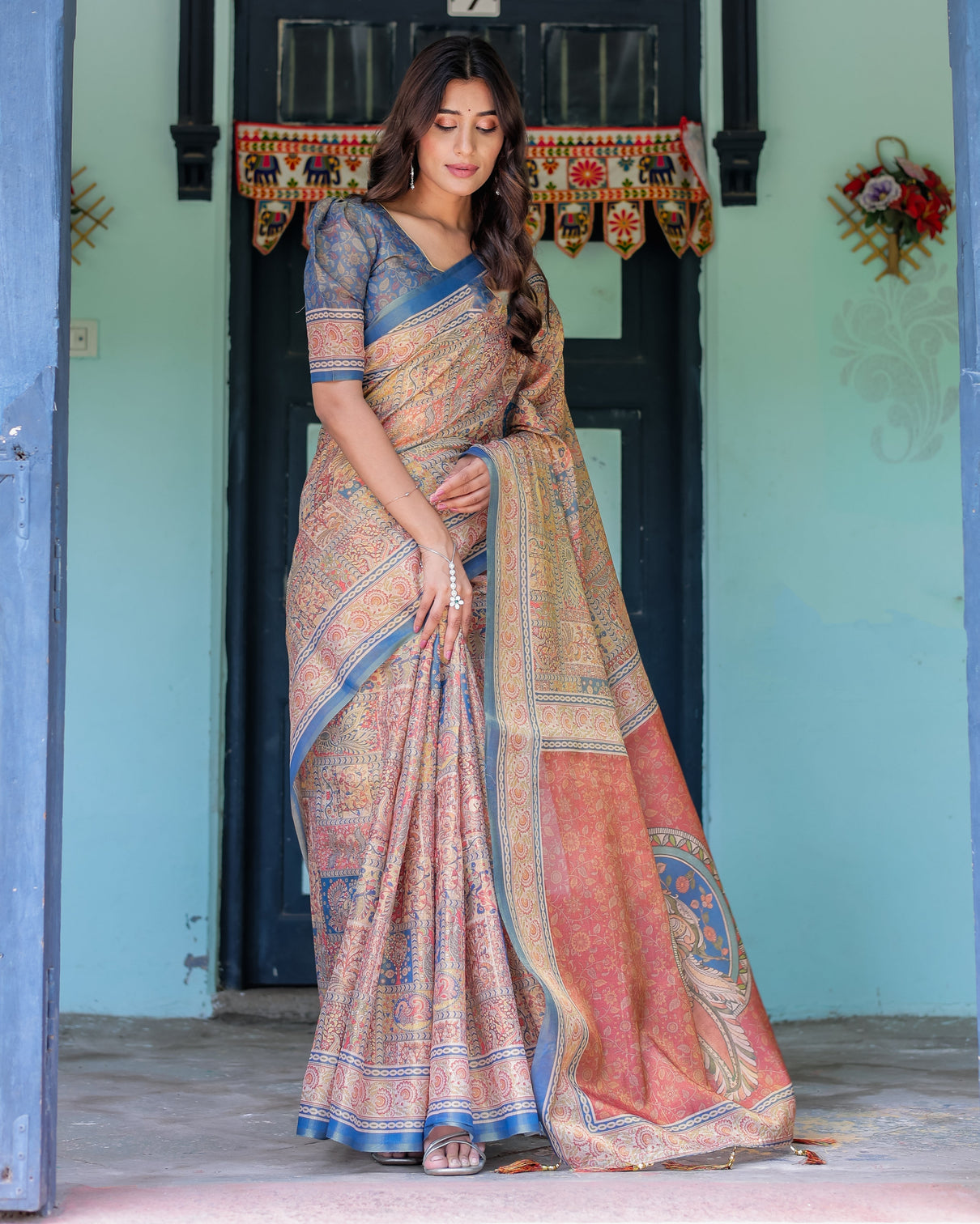 Rust blue handloom cotton saree with classical dancer motif and patchwork digital print
