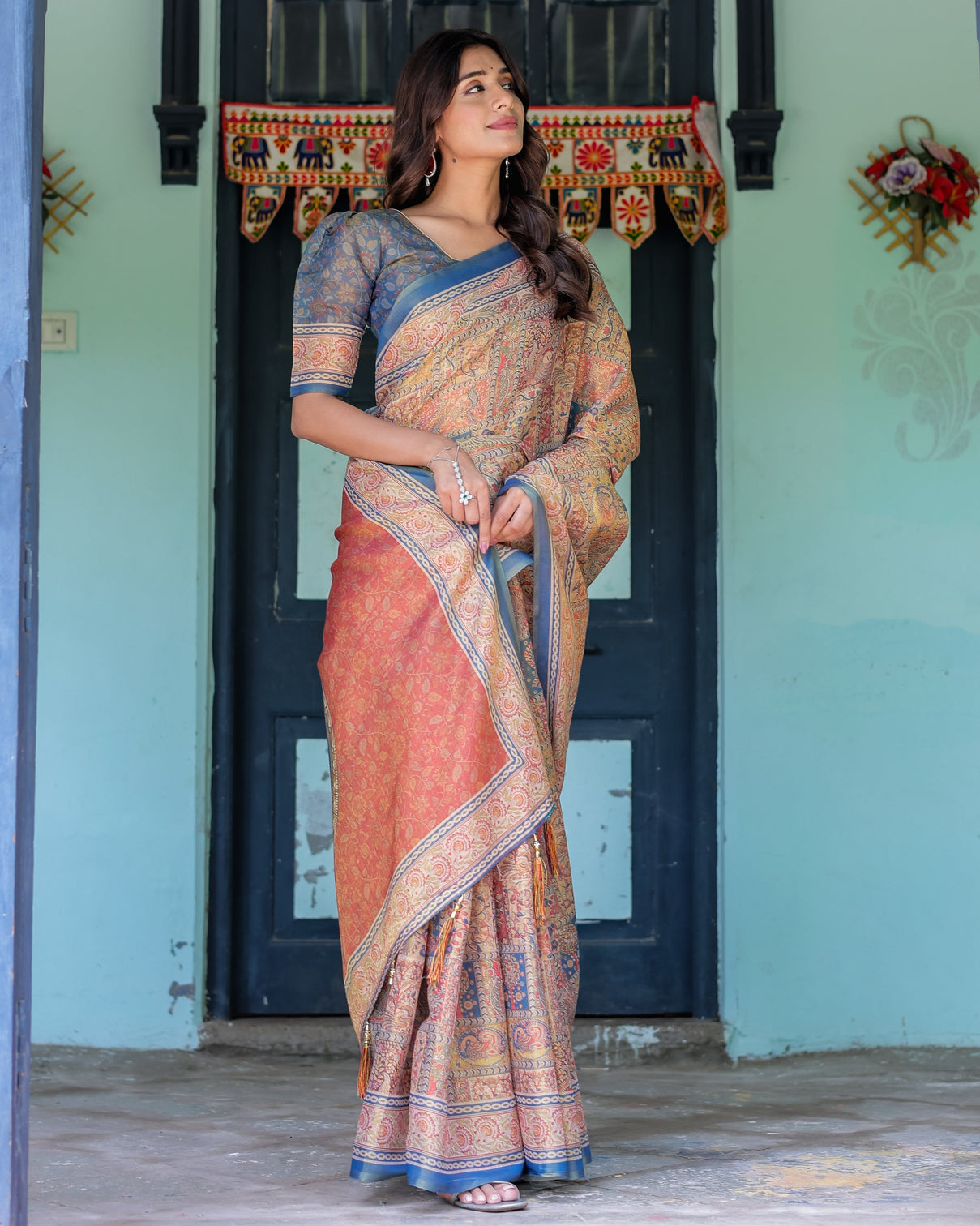 Rust blue handloom cotton saree with classical dancer motif and patchwork digital print
