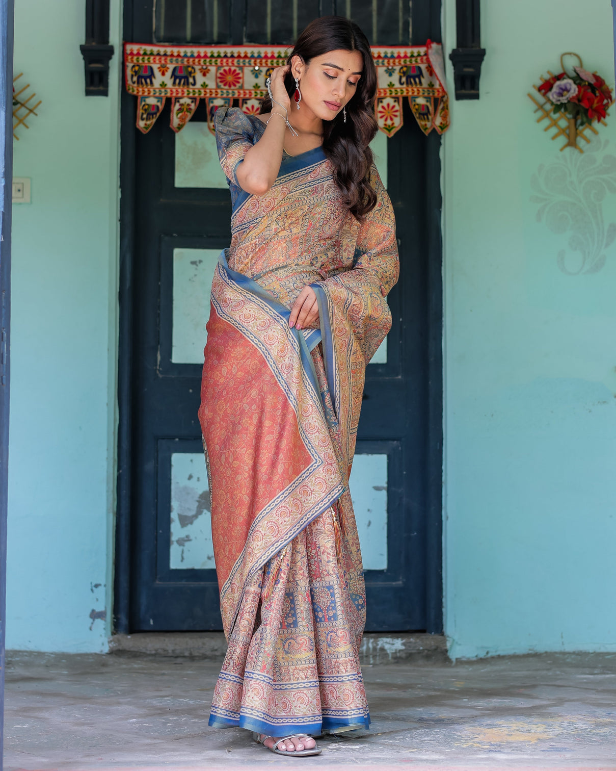 Rust blue handloom cotton saree with classical dancer motif and patchwork digital print