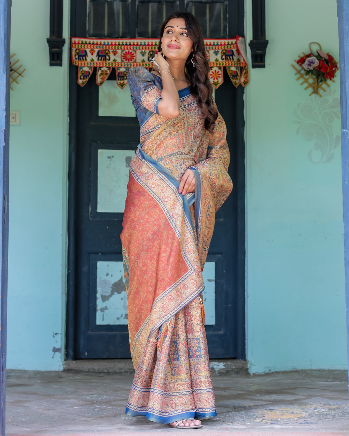 Rust blue handloom cotton saree with classical dancer motif and patchwork digital print
