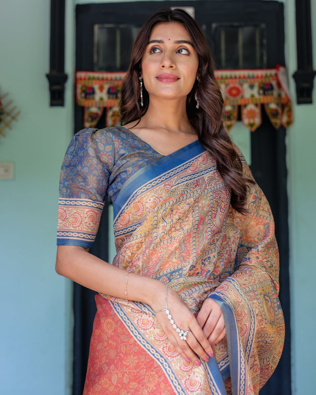 Rust blue handloom cotton saree with classical dancer motif and patchwork digital print