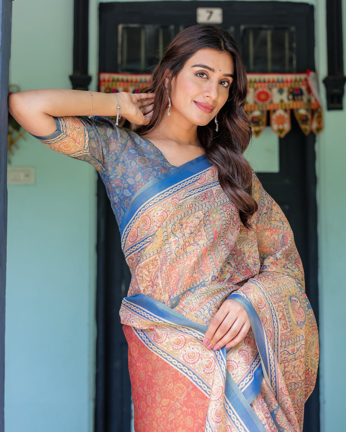 Rust blue handloom cotton saree with classical dancer motif and patchwork digital print