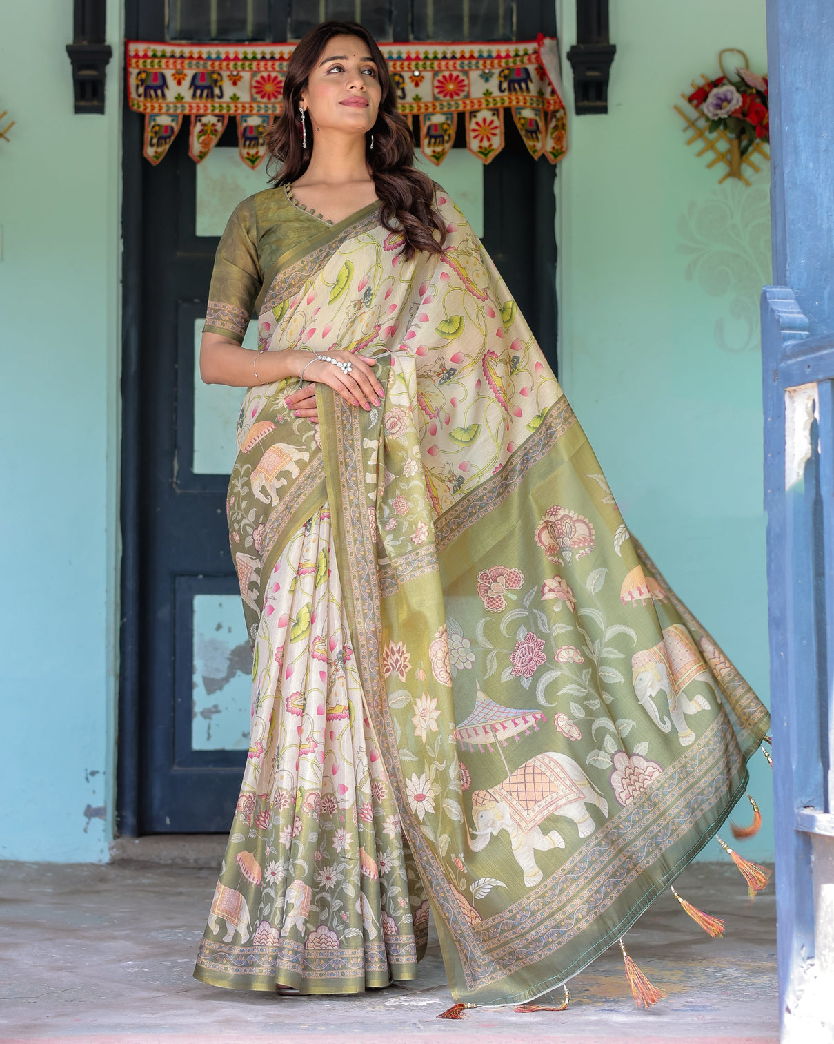 Olive green ivory handloom cotton saree with lotus blooms and royal elephant motifs