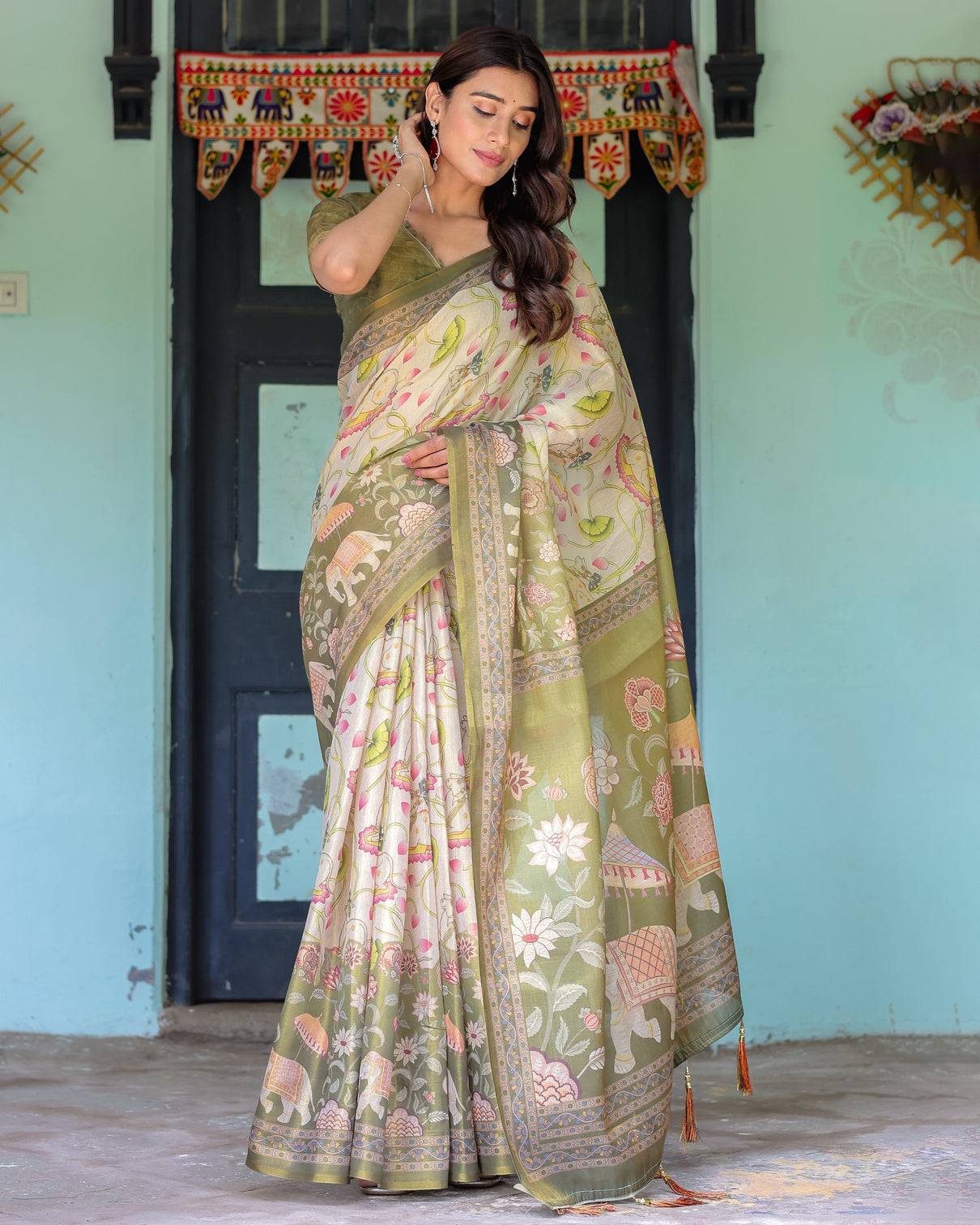 Olive green ivory handloom cotton saree with lotus blooms and royal elephant motifs