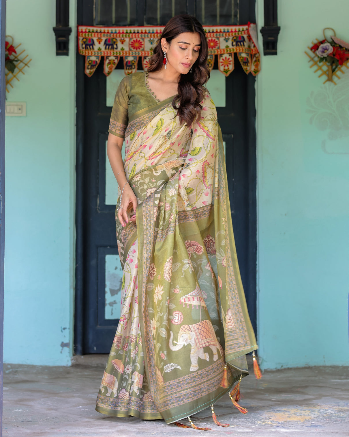 Olive green ivory handloom cotton saree with lotus blooms and royal elephant motifs