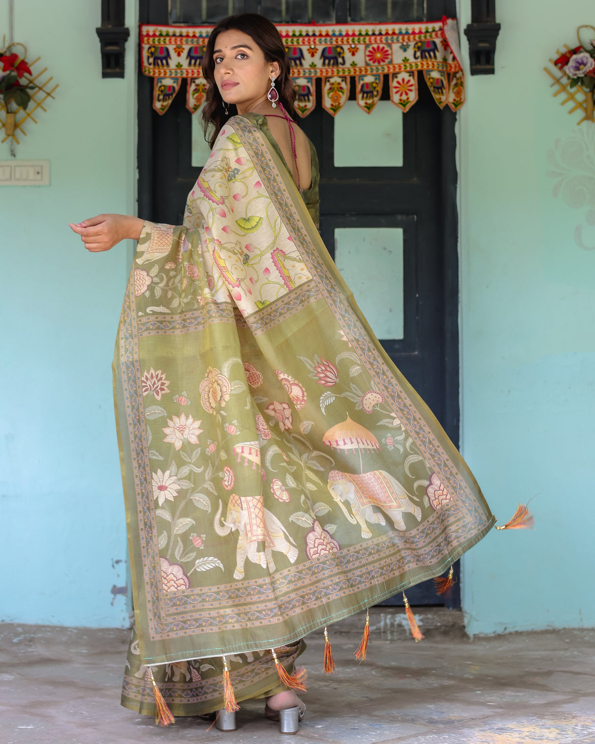 Olive green ivory handloom cotton saree with lotus blooms and royal elephant motifs