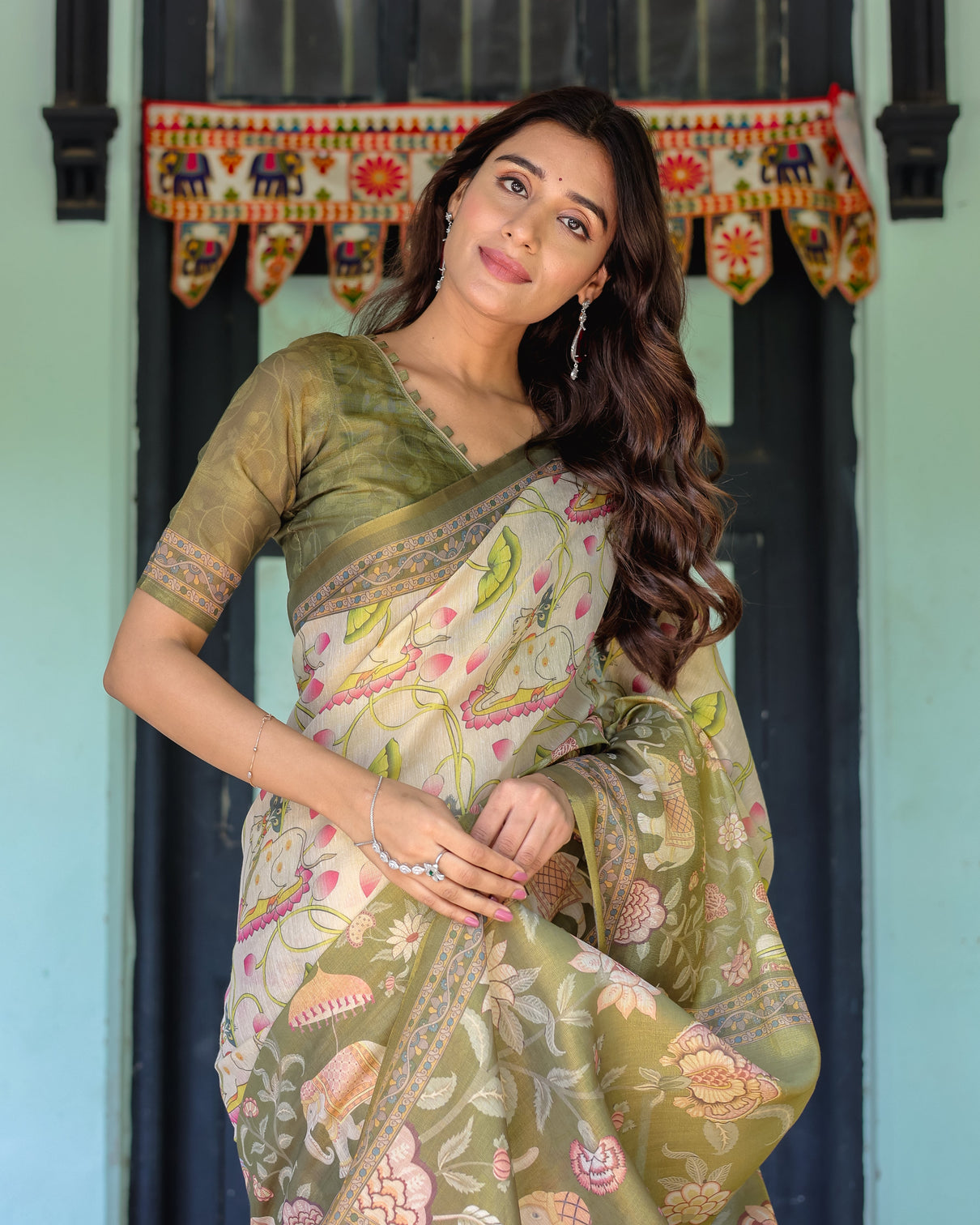 Olive green ivory handloom cotton saree with lotus blooms and royal elephant motifs