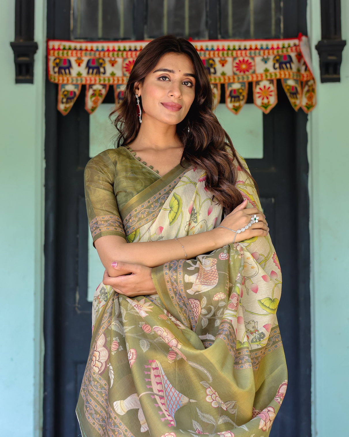 Olive green ivory handloom cotton saree with lotus blooms and royal elephant motifs