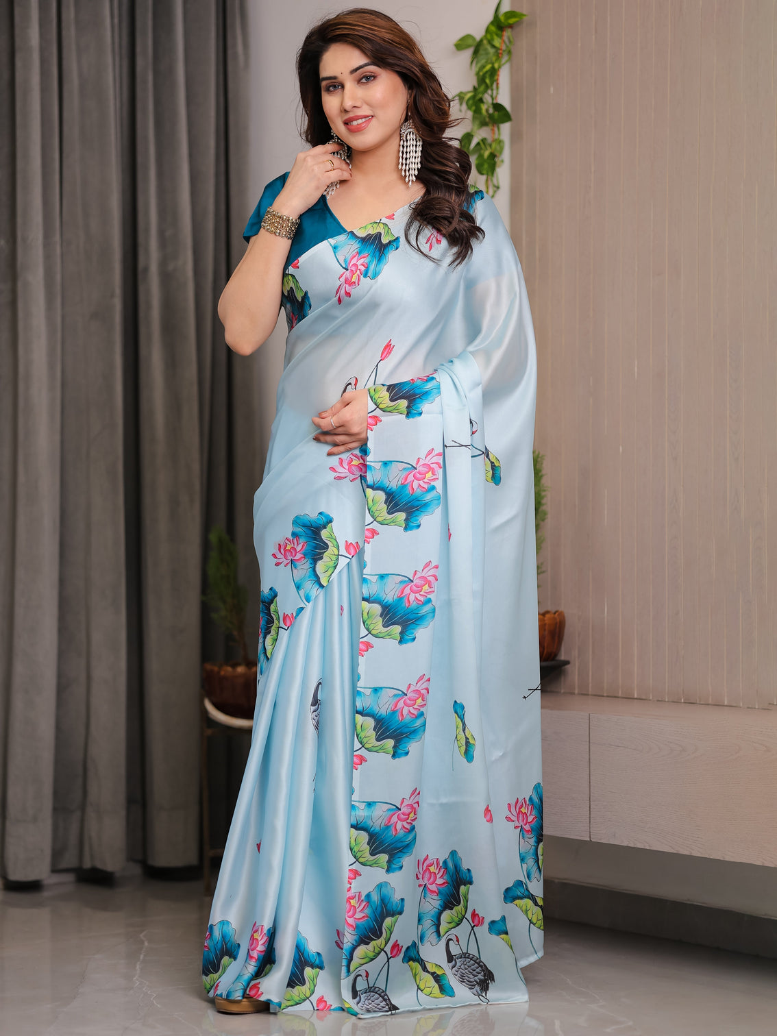 Sky blue satin georgette lotus crane printed saree with attached blouse serene nature inspired designer drape