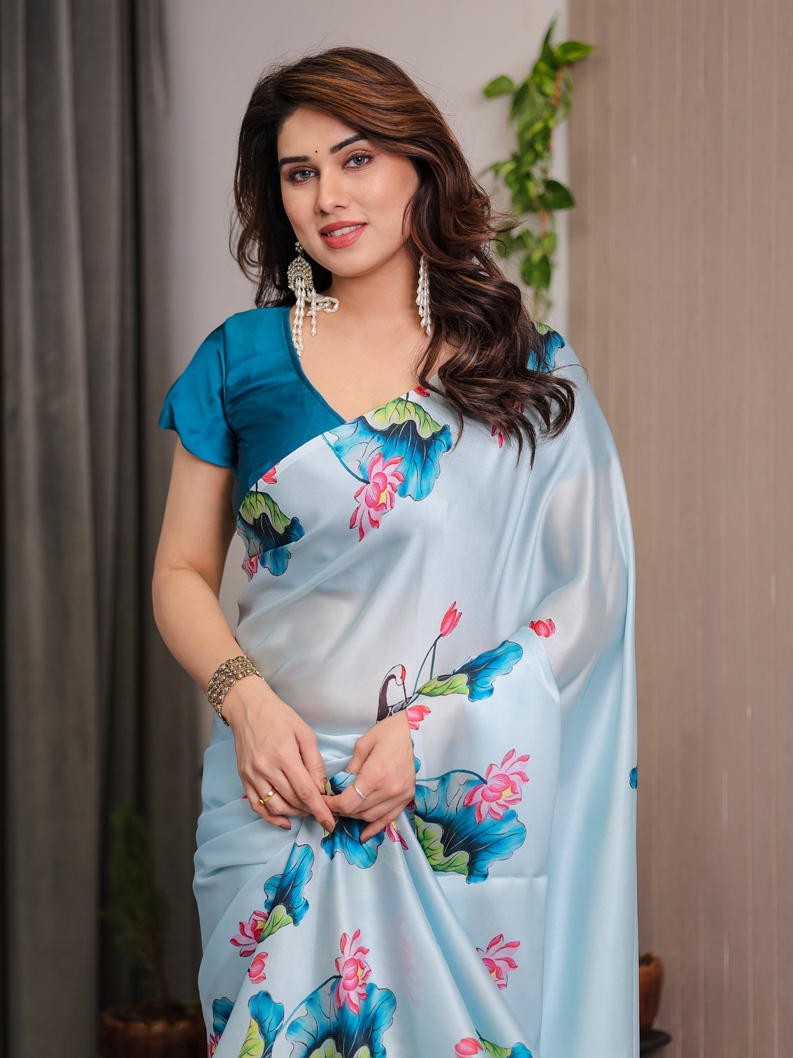 Sky blue satin georgette lotus crane printed saree with attached blouse serene nature inspired designer drape