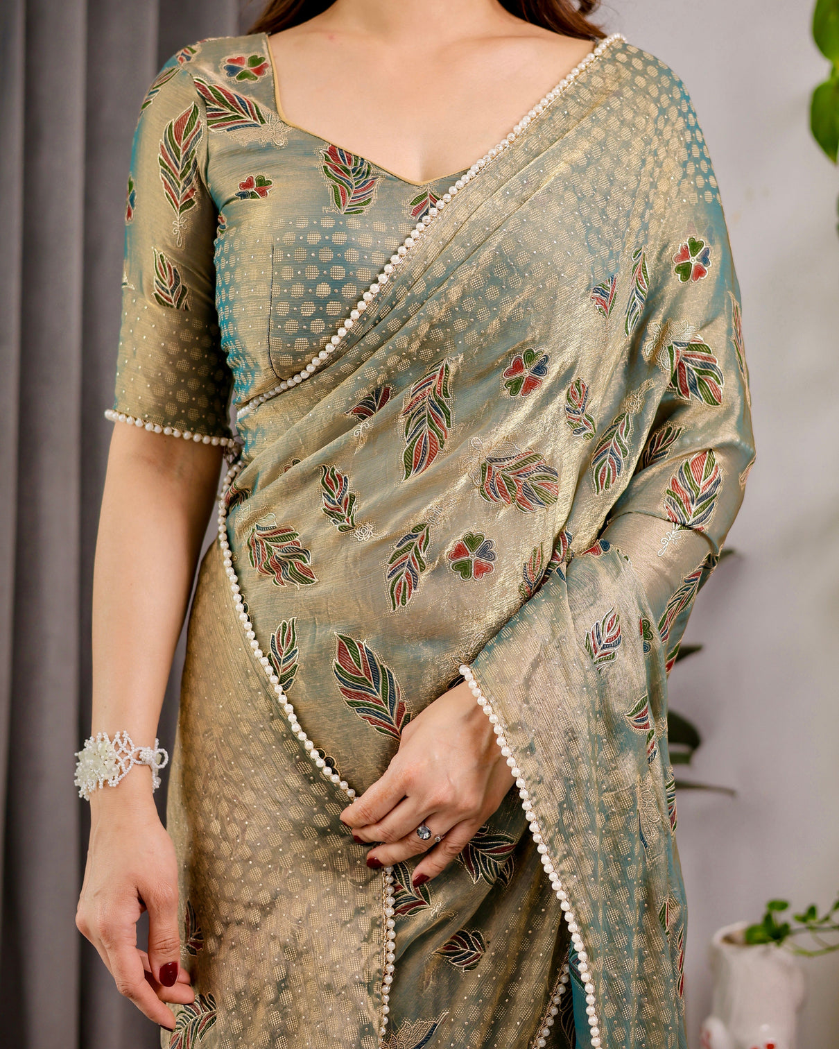 Pastel green fendy chiffon saree with foil block prints pearl lace tassel edges mameraa