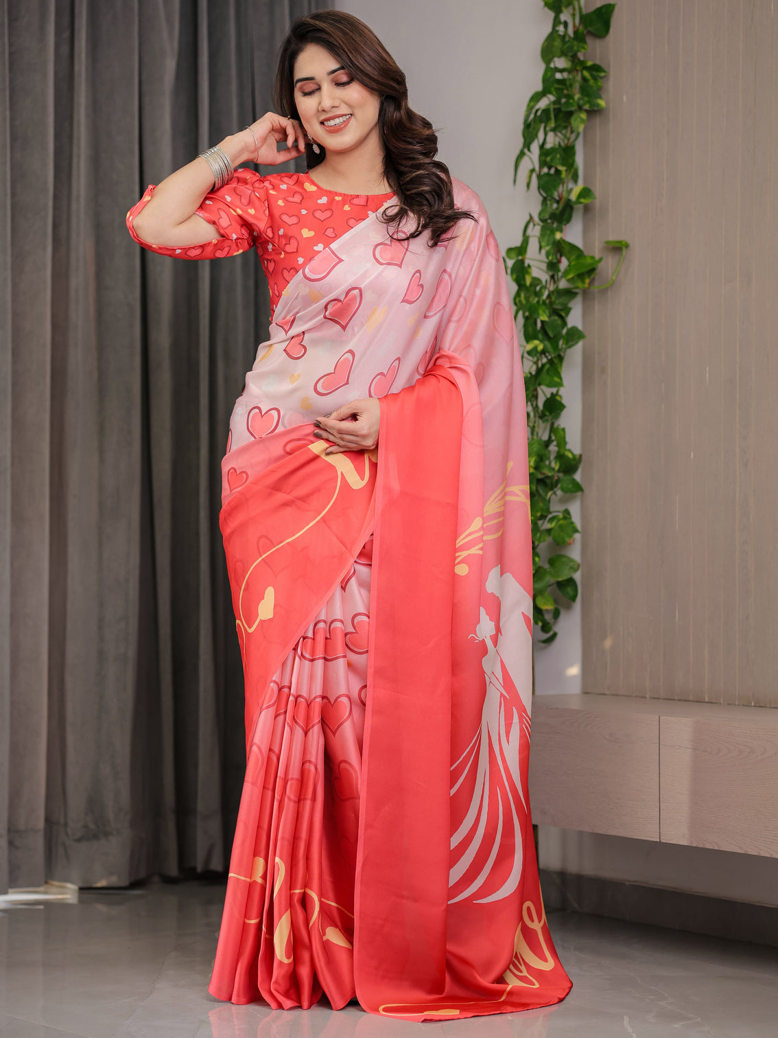 Coral red blush pink heart printed satin georgette saree with romantic couple pallu and attached heart print blouse 5 5 meter designer saree for valentine s day anniversary wear