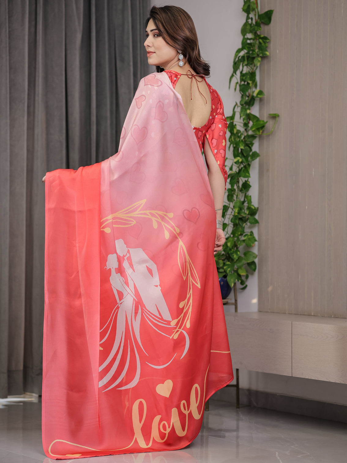 Coral red blush pink heart printed satin georgette saree with romantic couple pallu and attached heart print blouse 5 5 meter designer saree for valentine s day anniversary wear