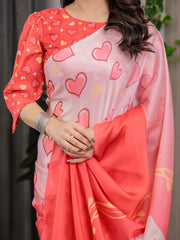 Coral red blush pink heart printed satin georgette saree with romantic couple pallu and attached heart print blouse 5 5 meter designer saree for valentine s day anniversary wear