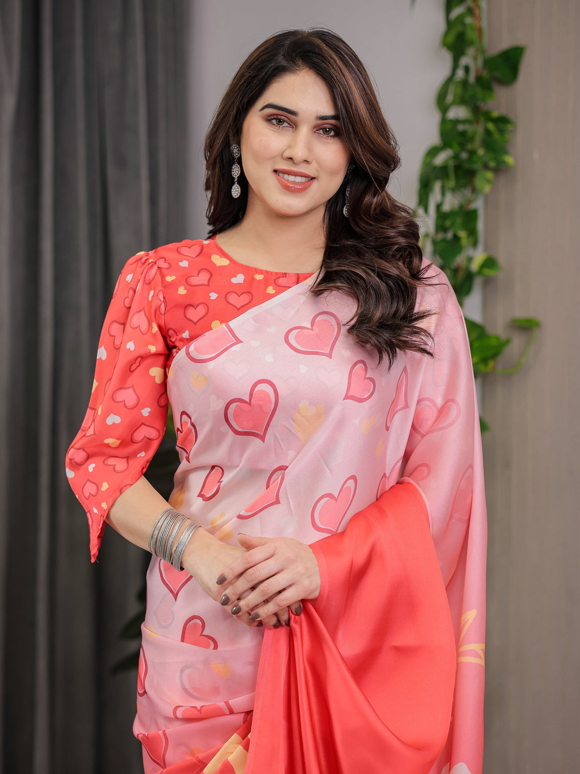 Coral red blush pink heart printed satin georgette saree with romantic couple pallu and attached heart print blouse 5 5 meter designer saree for valentine s day anniversary wear