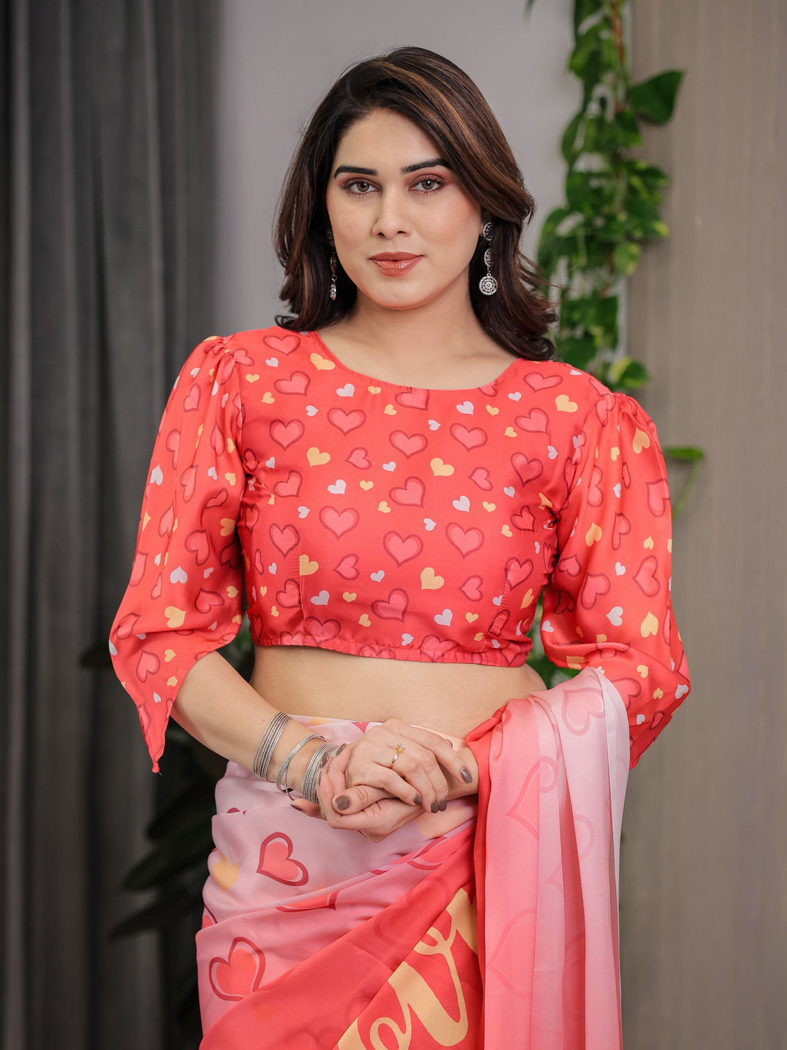 Coral red blush pink heart printed satin georgette saree with romantic couple pallu and attached heart print blouse 5 5 meter designer saree for valentine s day anniversary wear