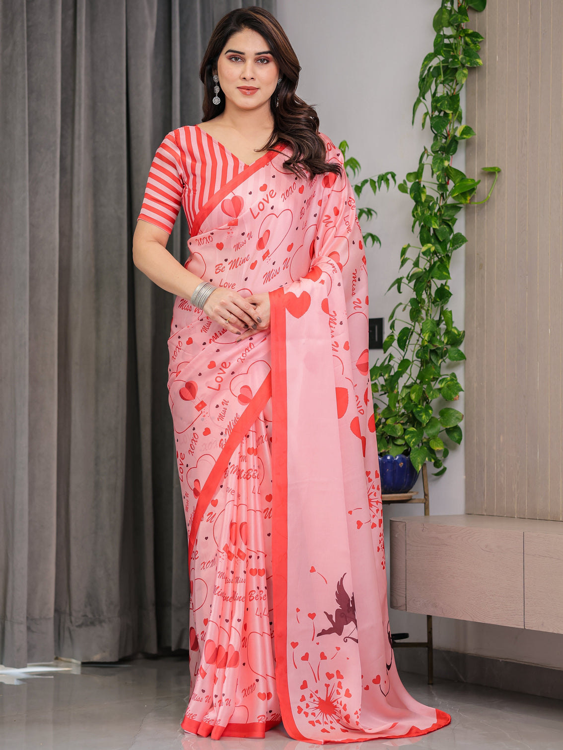 Blush pink coral red heart print satin georgette saree with romantic love typography pallu and attached striped blouse 5 5 meter designer saree for valentine s day anniversary wear mameraa