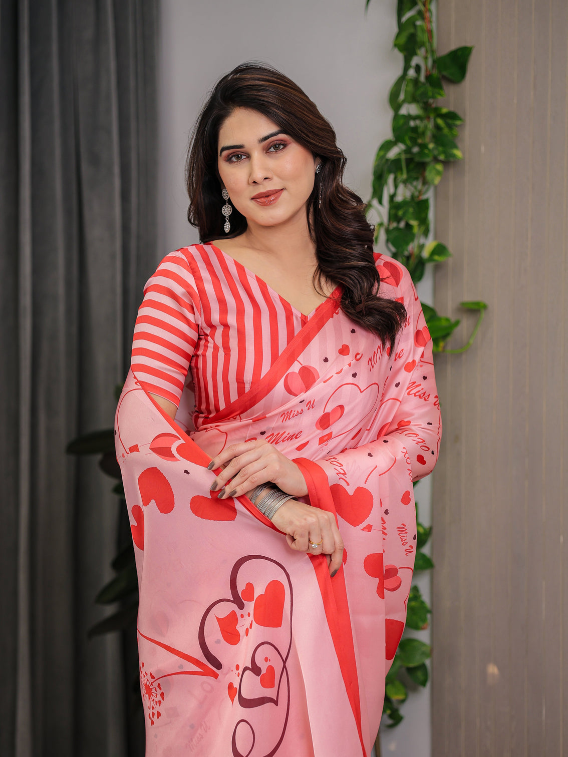 Blush pink coral red heart print satin georgette saree with romantic love typography pallu and attached striped blouse 5 5 meter designer saree for valentine s day anniversary wear