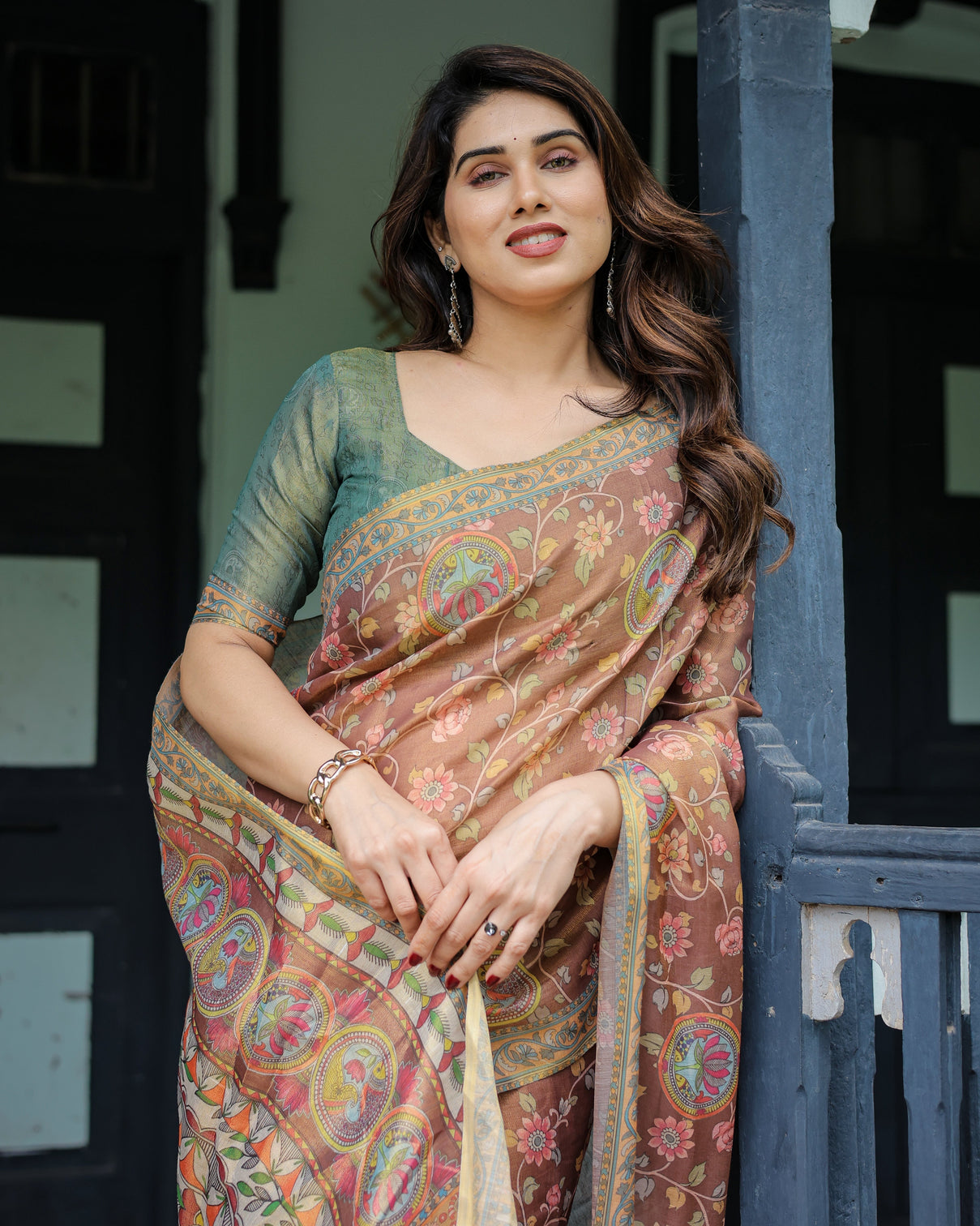 Rust red handloom cotton saree with madhubani fish art floral motifs contrast blouse