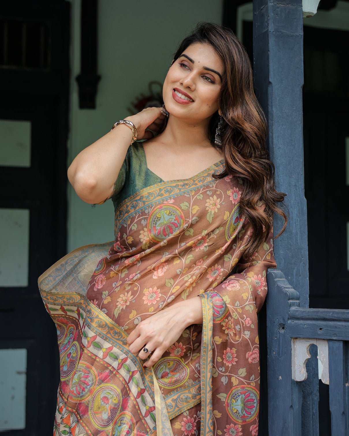 Rust red handloom cotton saree with madhubani fish art floral motifs contrast blouse