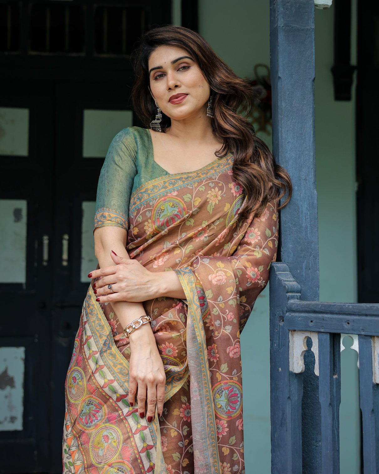 Rust red handloom cotton saree with madhubani fish art floral motifs contrast blouse