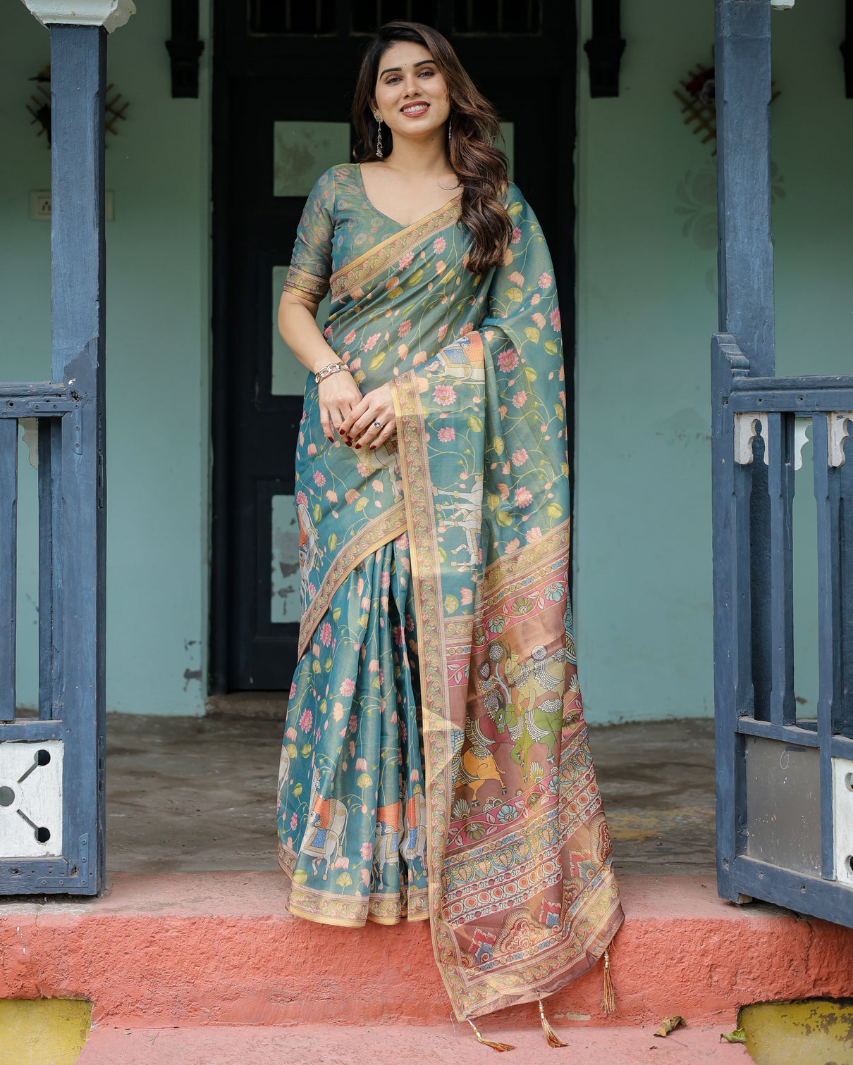 Divine procession teal green handloom cotton saree with lotus floral print artistic pallu mameraa
