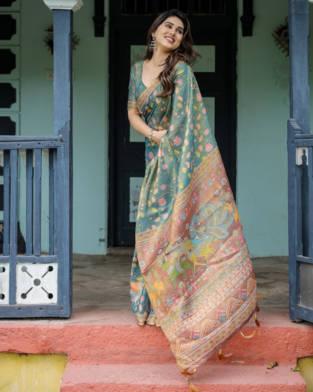 Divine procession teal green handloom cotton saree with lotus floral print artistic pallu
