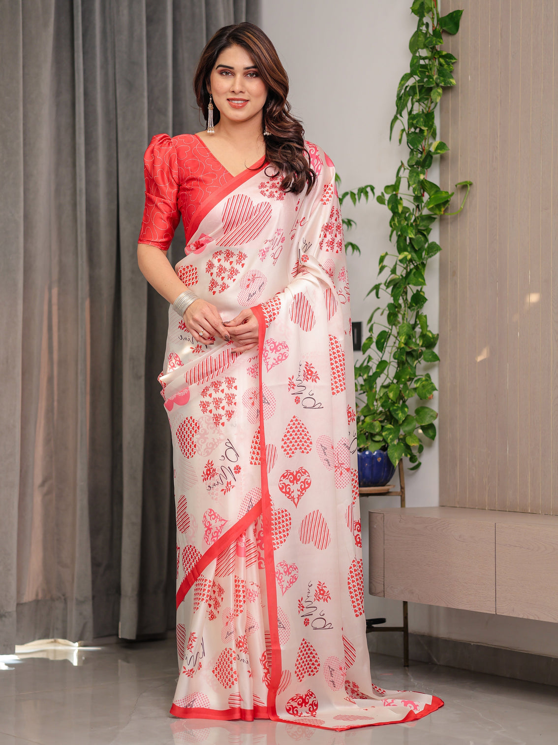 Ivory pink red love themed satin georgette saree with heart prints and romantic pallu attached blouse mameraa
