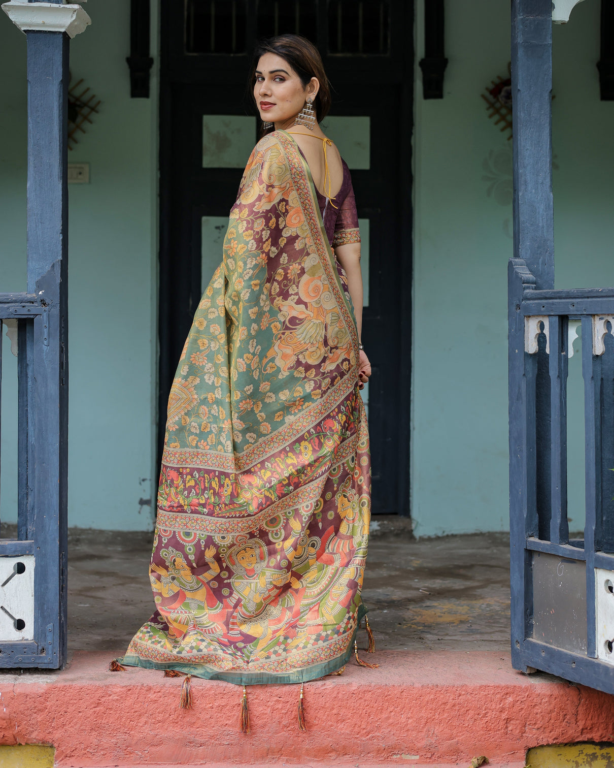 Sage green maroon handloom cotton saree with mythical tribal art and floral motifs