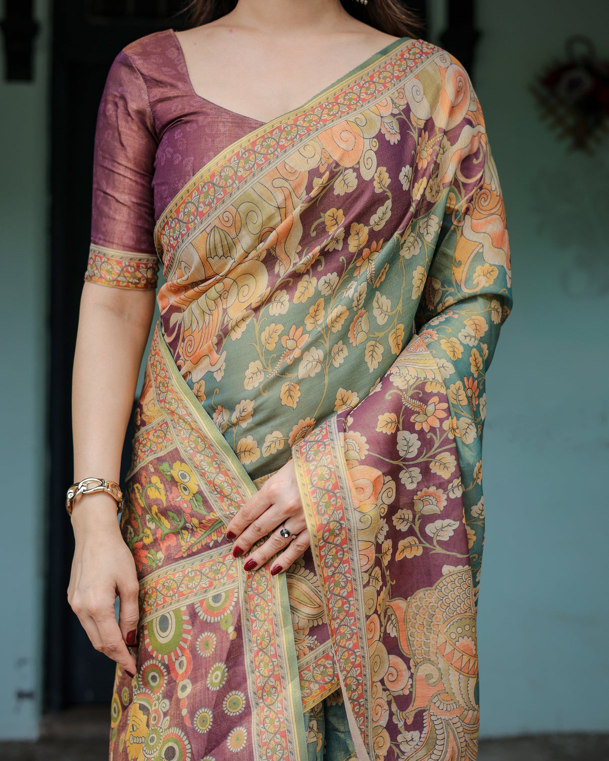 Sage green maroon handloom cotton saree with mythical tribal art and floral motifs