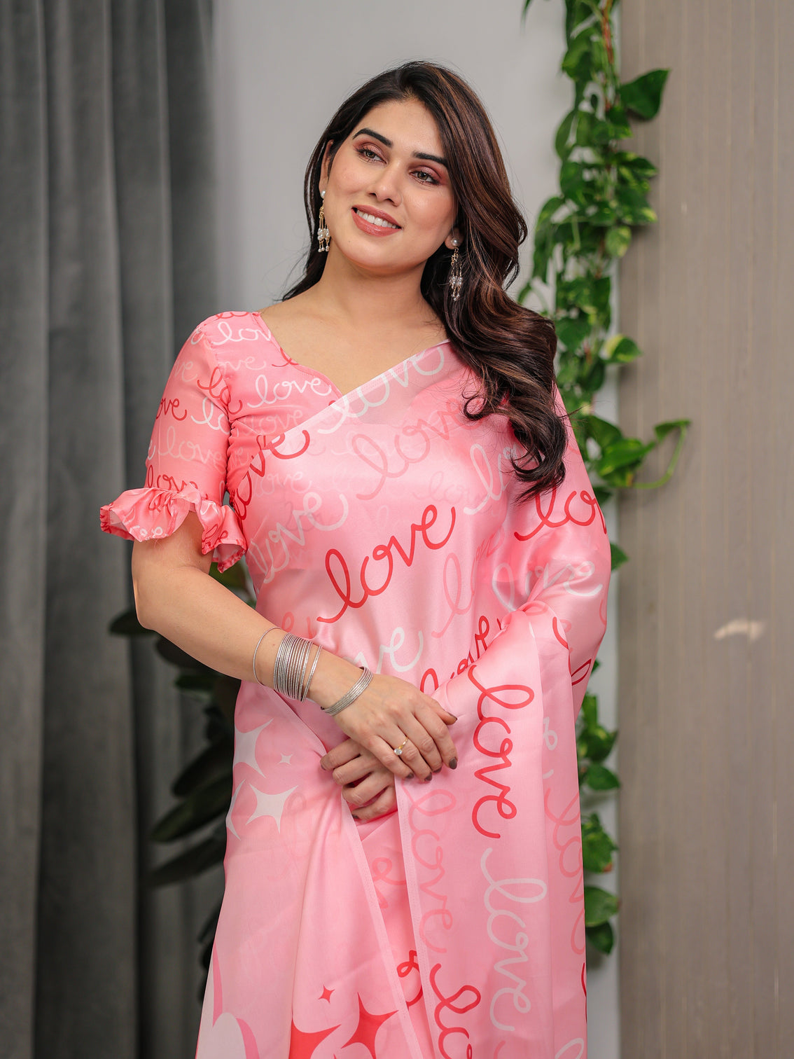 Blush pink satin georgette saree with all over love typography print and attached matching printed blouse 5 5 meter romantic designer saree for valentine s day anniversary wear