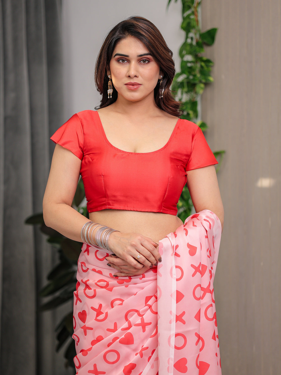 Blush pink satin georgette love themed printed saree with romantic heart typography motifs and matching blouse