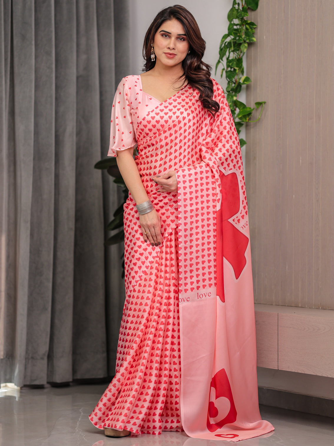 Soft blush pink satin georgette heart printed saree with gradient love motif pallu matching blouse