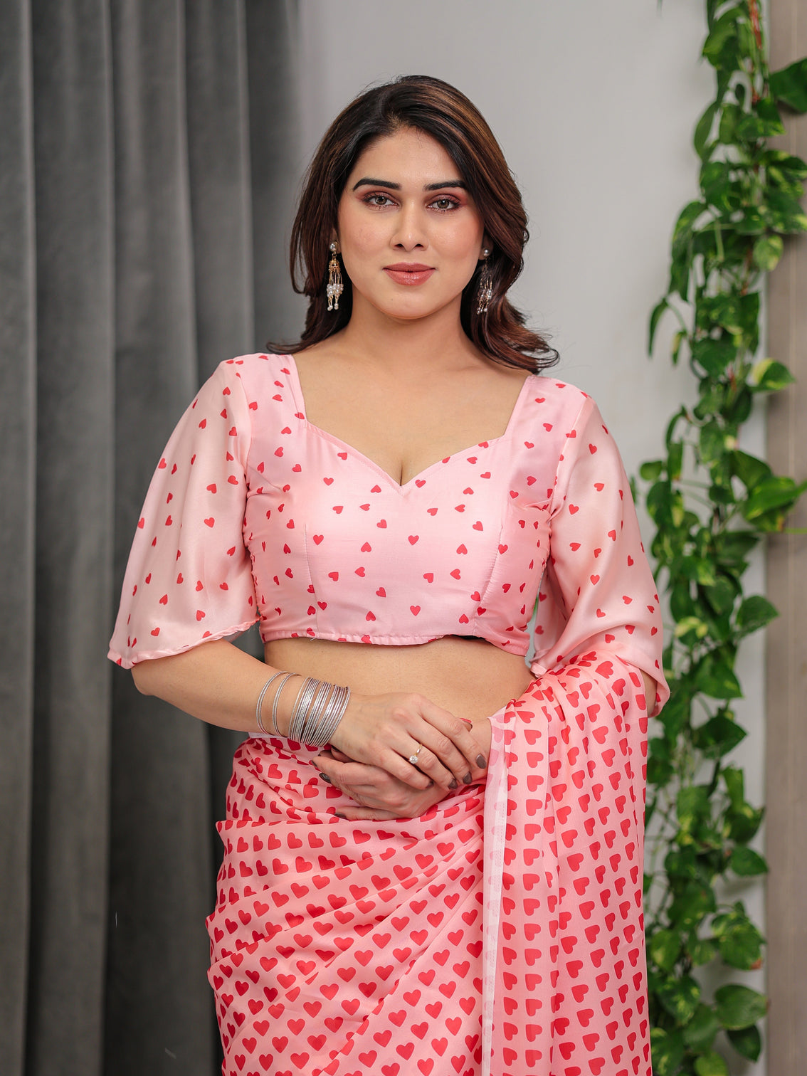 Soft blush pink satin georgette heart printed saree with gradient love motif pallu matching blouse