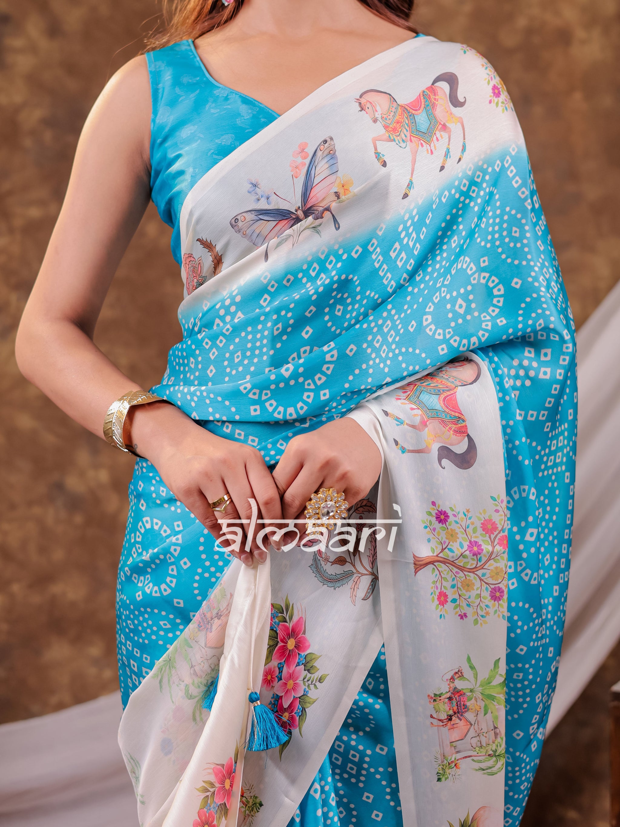 Vantara Aqua Blue Satin Chiffon Printed Saree with Heritage Floral Print, Designer Tassel Pallu & Matching Blouse Piece