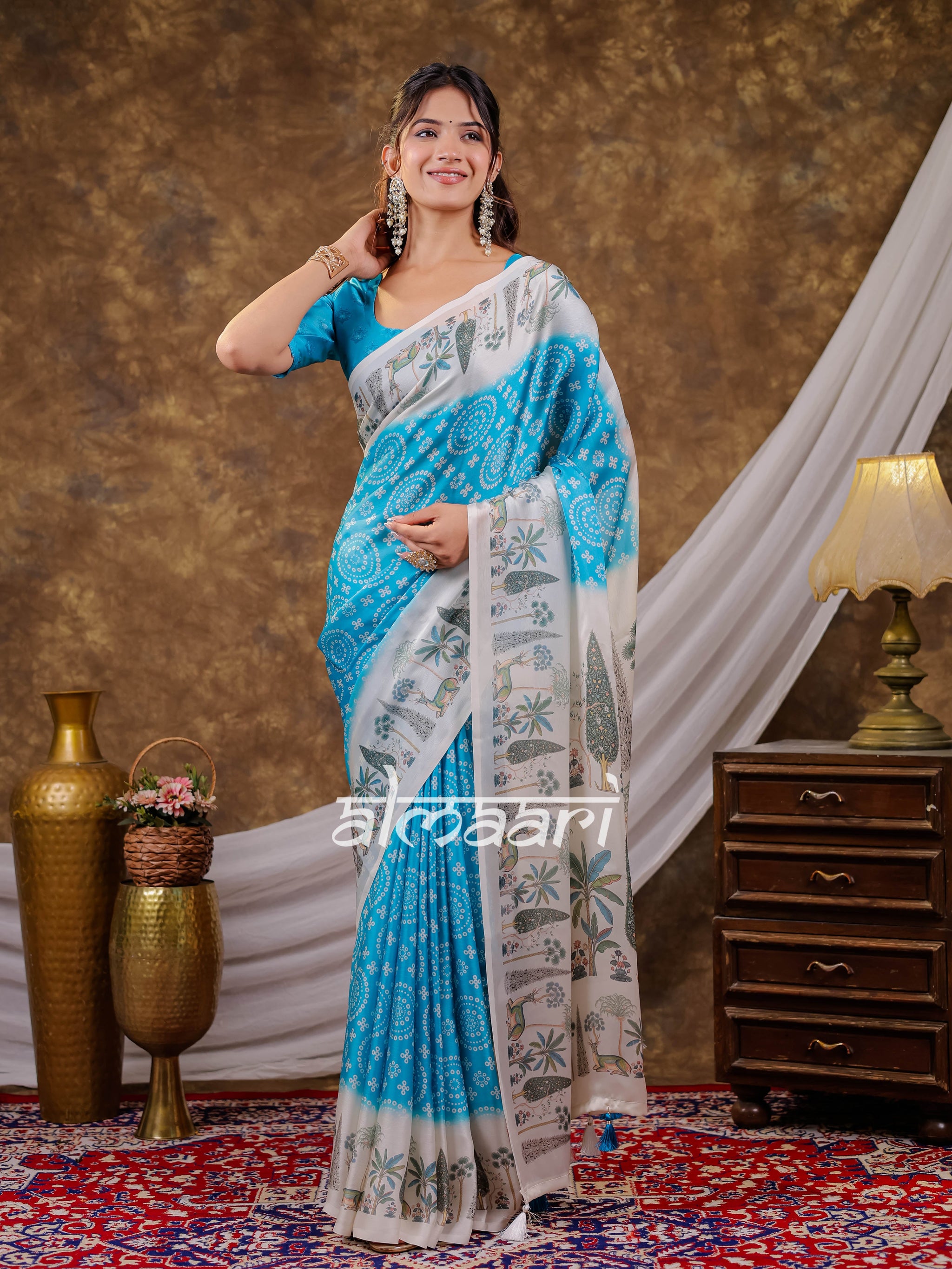 Vantara Turquoise Blue Satin Chiffon Printed Saree with Botanical Nature Print, Designer Tassel Pallu & Matching Blouse Piece