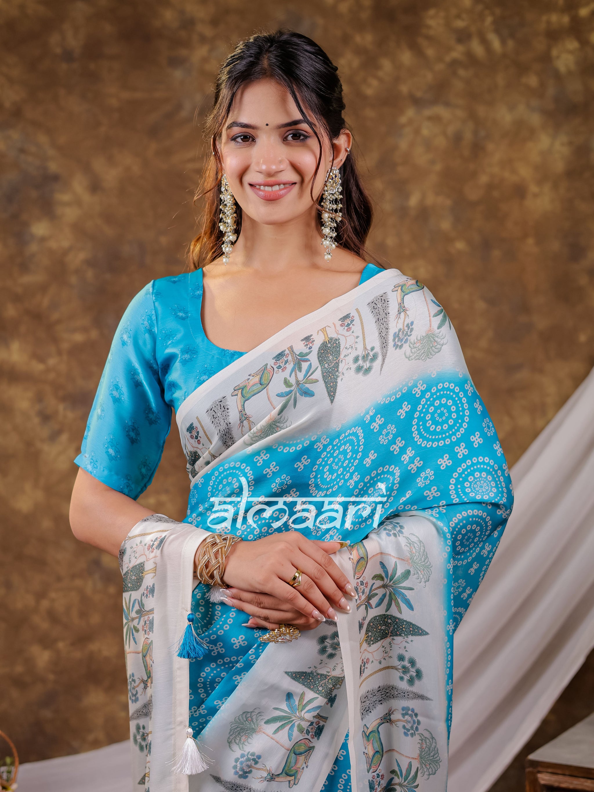 Vantara Turquoise Blue Satin Chiffon Printed Saree with Botanical Nature Print, Designer Tassel Pallu & Matching Blouse Piece