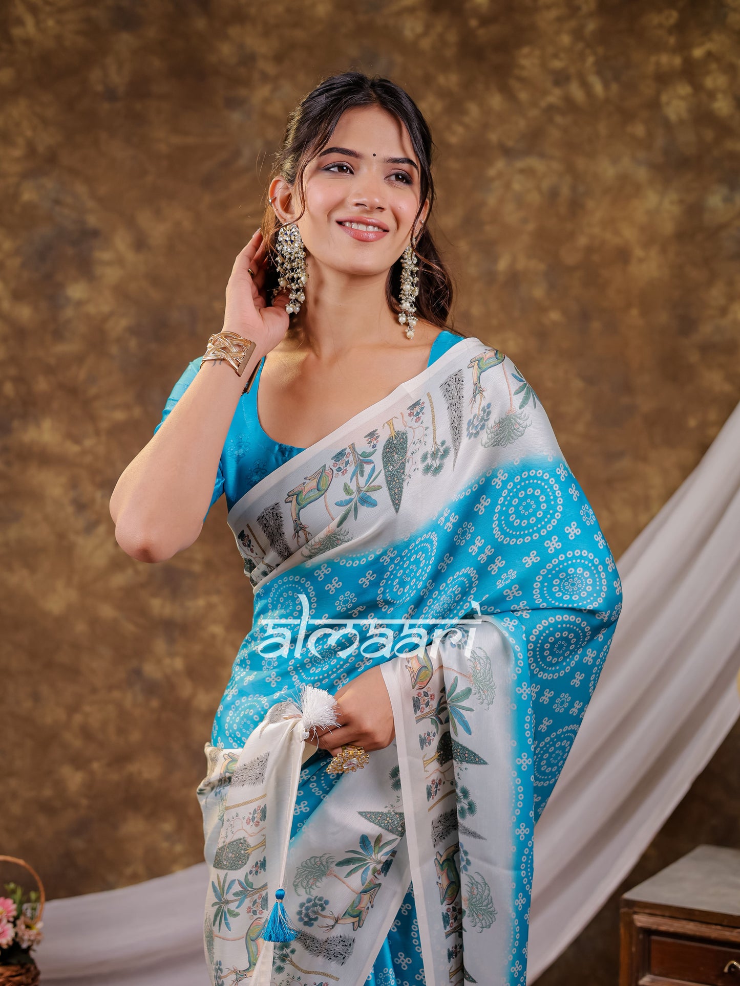 Vantara Turquoise Blue Satin Chiffon Printed Saree with Botanical Nature Print, Designer Tassel Pallu & Matching Blouse Piece