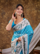 Vantara Turquoise Blue Satin Chiffon Printed Saree with Botanical Nature Print, Designer Tassel Pallu & Matching Blouse Piece